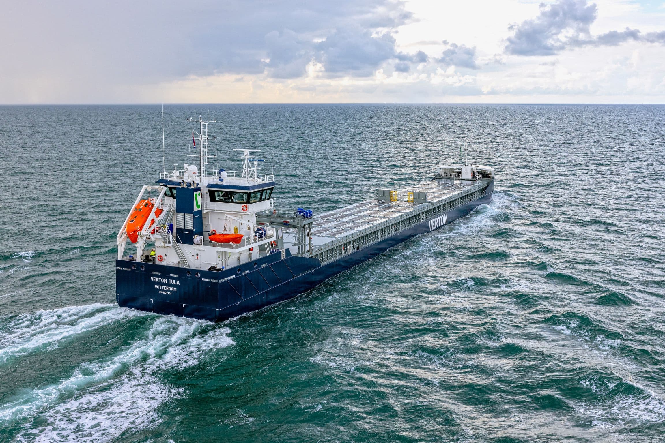 Solar Flatrack panels installed on the deck of an inland vessel at sea